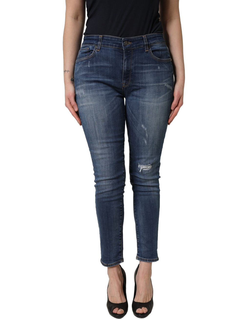 Jeans skinny déchirés bleu Dolce & Gabbana, taille mi-haute, en denim avec détails usés et style tendance.