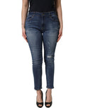 Jeans skinny déchirés bleu Dolce & Gabbana, taille mi-haute, en denim avec détails usés et style tendance.