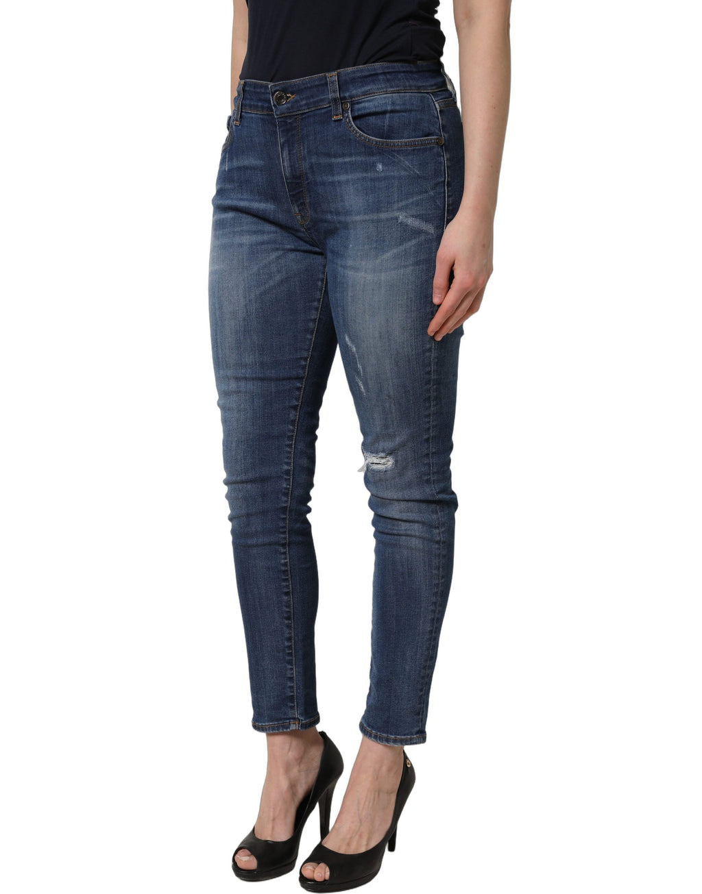 Jeans skinny déchirés Dolce & Gabbana en denim bleu à taille mi-haute avec un style décontracté et tendance.