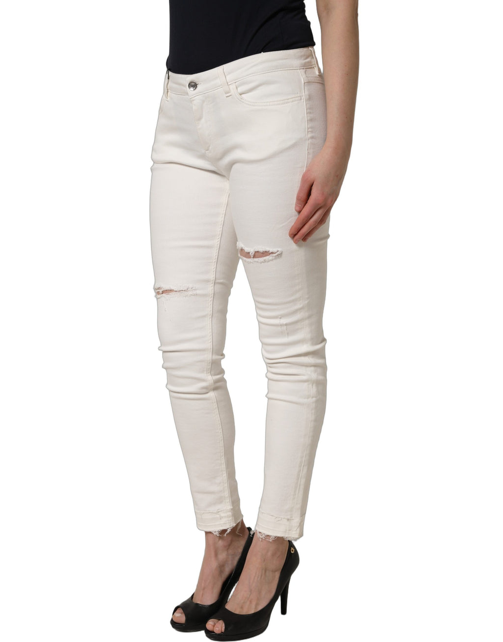 Jeans skinny en coton déchiré blanc de Dolce & Gabbana, style tendance avec détails usés, pour un look moderne et décontracté.