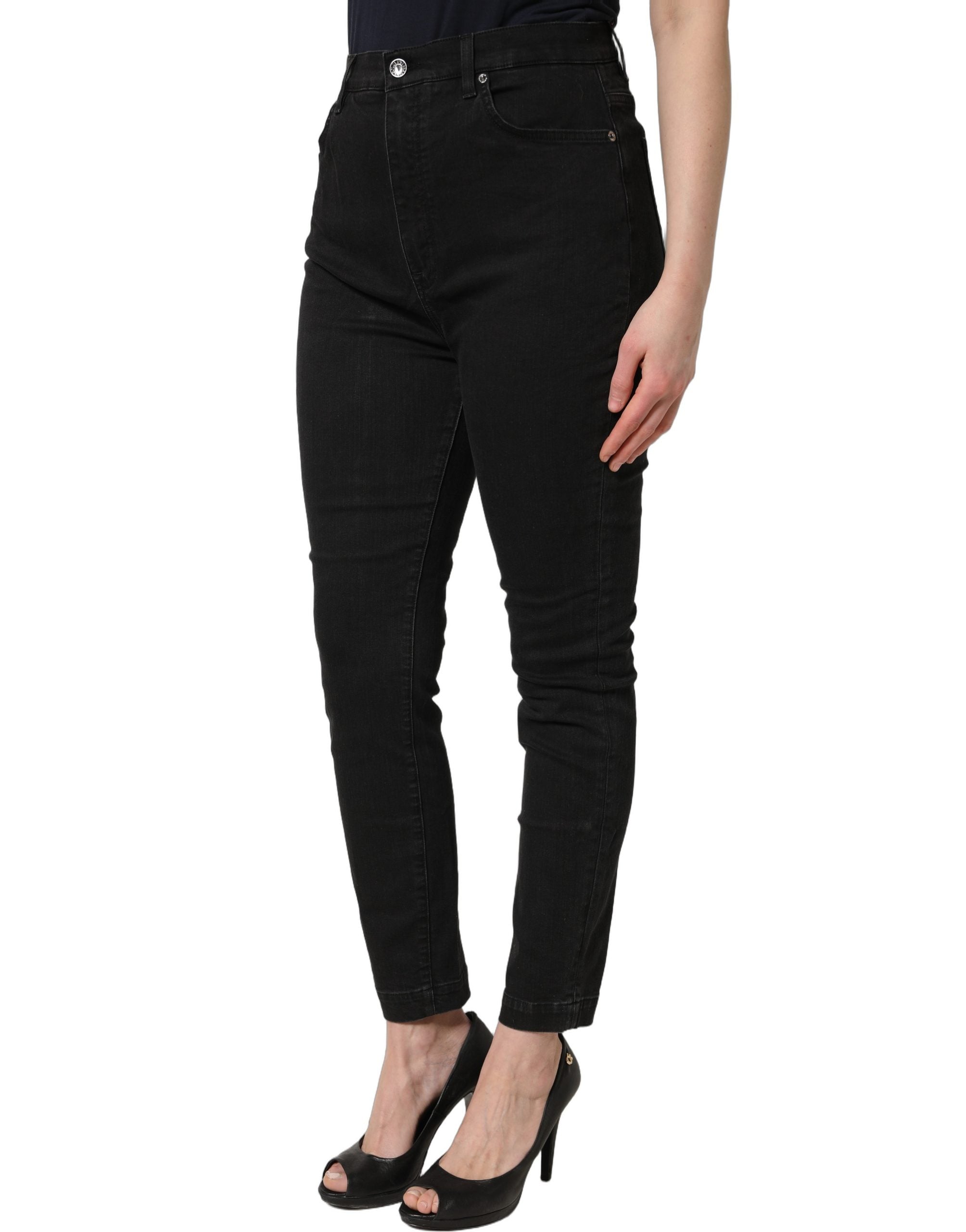 Jeans skinny noirs en coton à taille haute de Dolce & Gabbana, coupe ajustée et détails modernes.