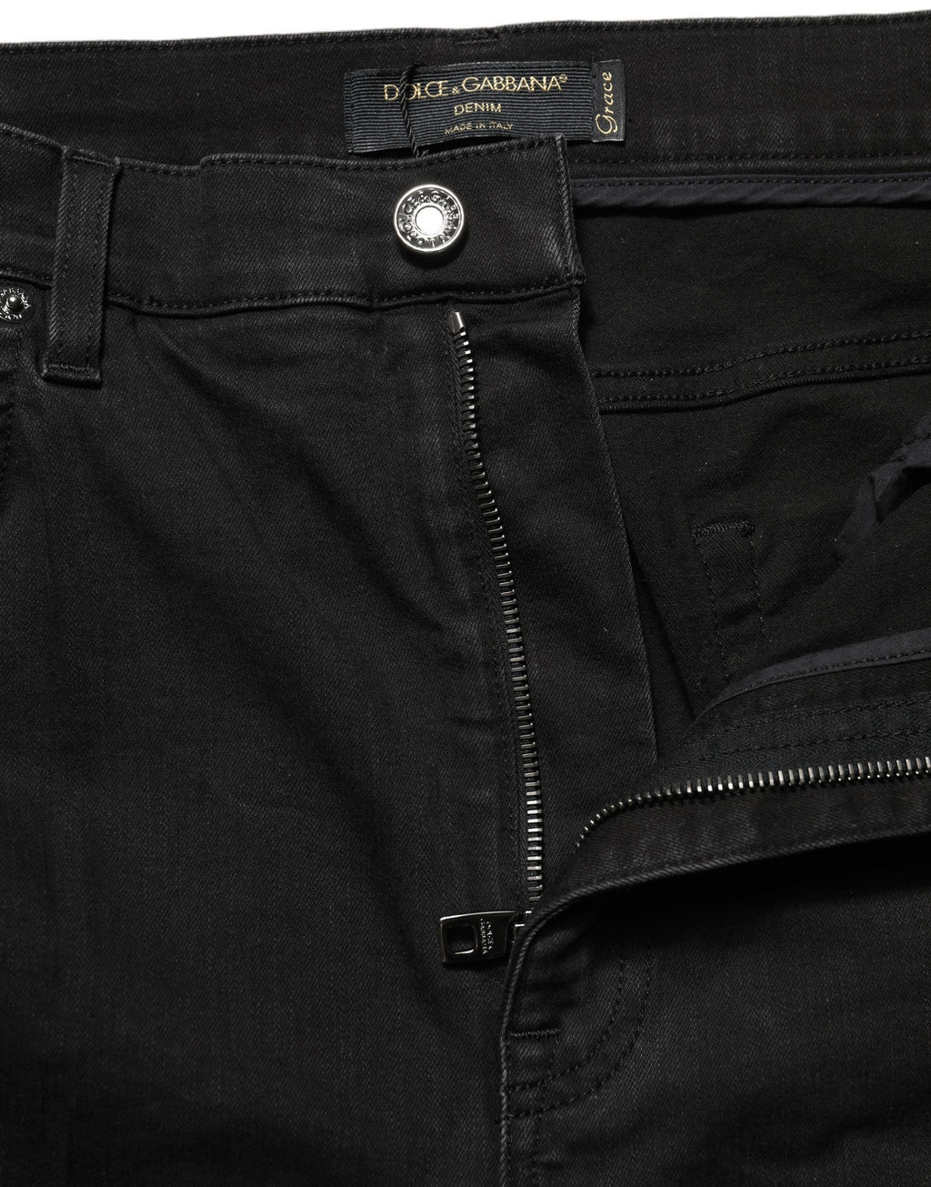 Jeans skinny noirs Dolce & Gabbana en coton à taille haute, coupe ajustée et détails en denim.