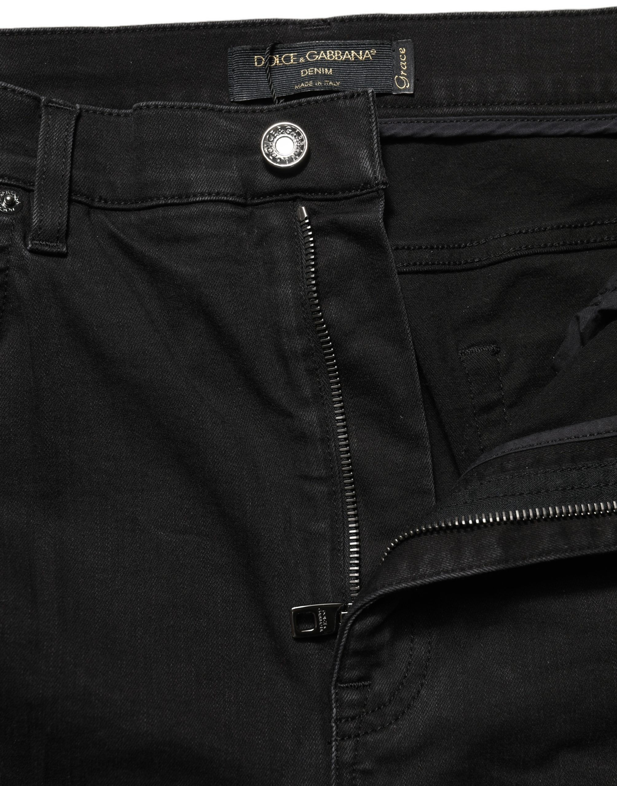 Jeans skinny noirs Dolce & Gabbana en coton à taille haute, coupe ajustée et détails en denim.