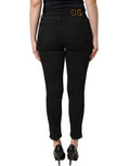 Jeans skinny en coton noir de Dolce & Gabbana, taille basse, denim élégant, ajusté et tendance.