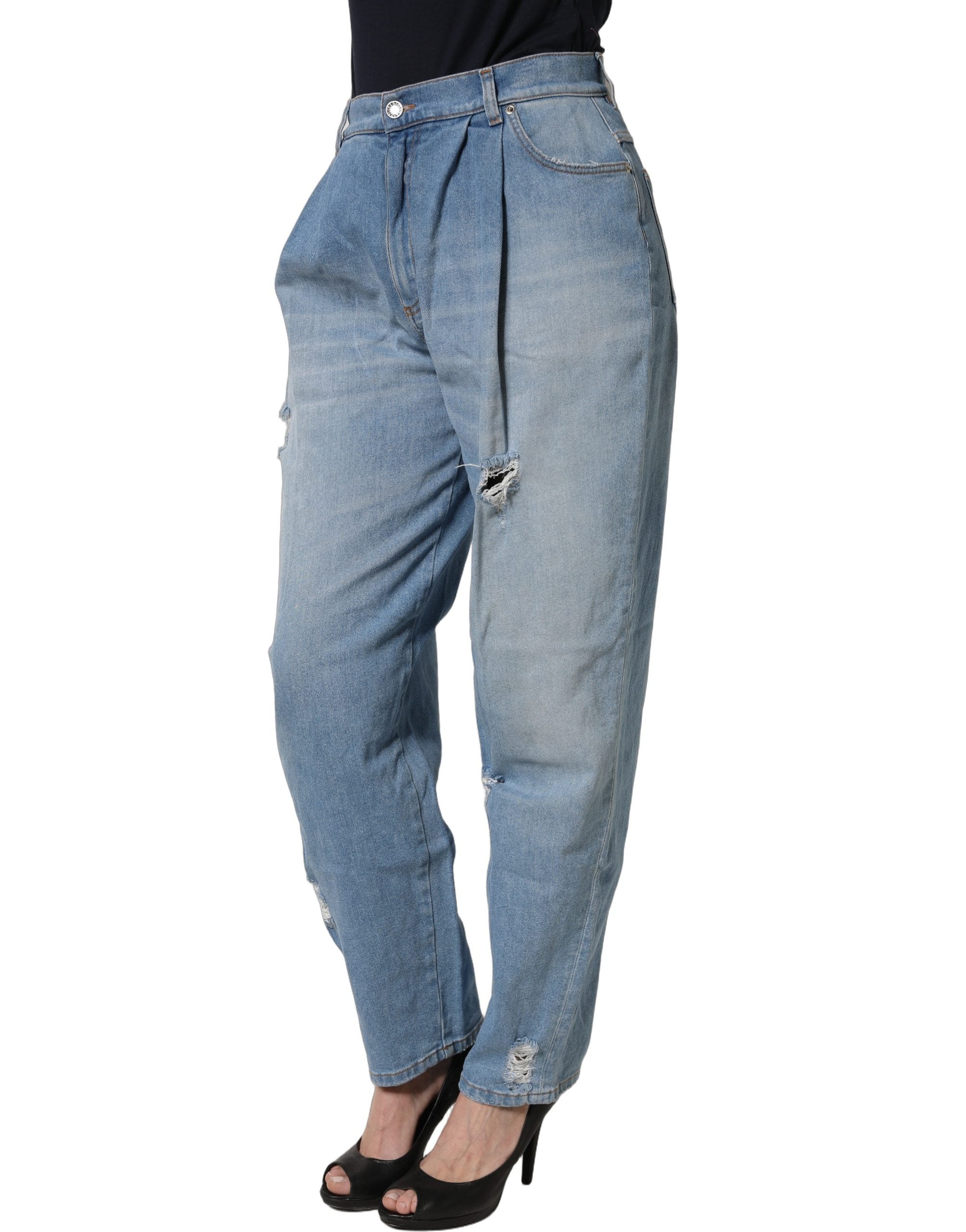Jeans en denim coton bleu délavé à plis et usures Dolce & Gabbana, style décontracté et tendance.