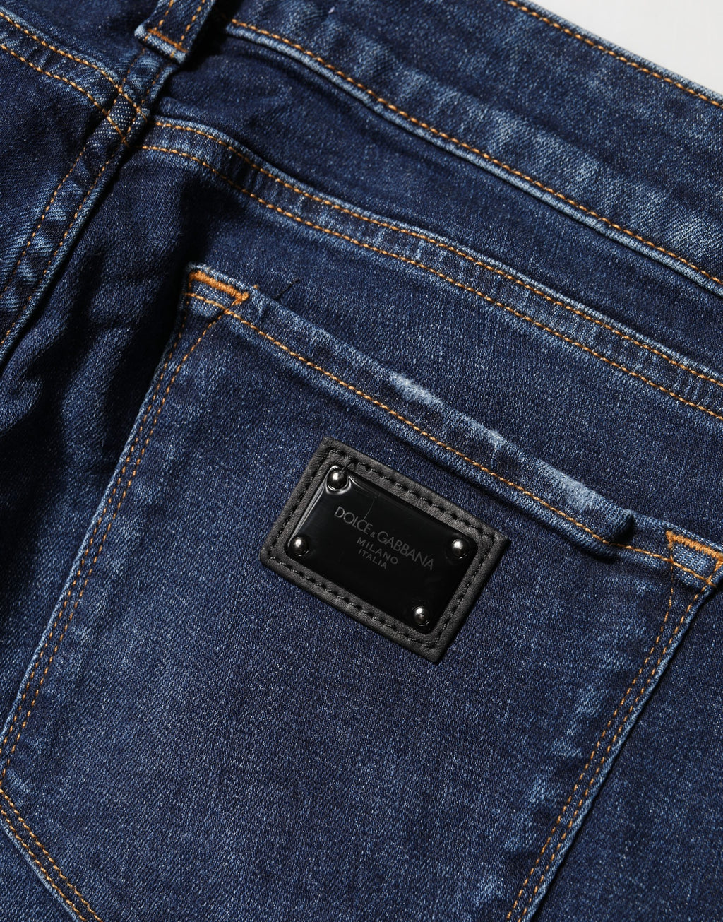 Jeans skinny en coton denim bleu délavé de Dolce & Gabbana, style distressed, pour femme.