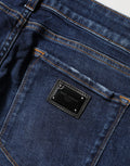 Jeans skinny en coton denim bleu délavé de Dolce & Gabbana, style distressed, pour femme.