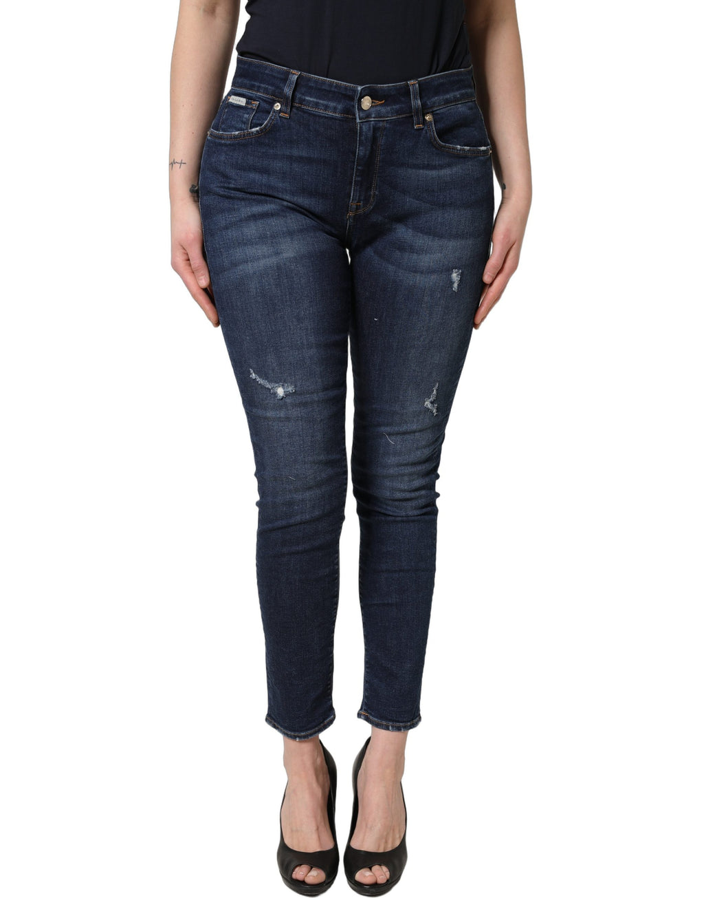 Pantalon en jean skinny bleu délavé en coton de Dolce & Gabbana, style usé et ajusté, avec détails déchirés.
