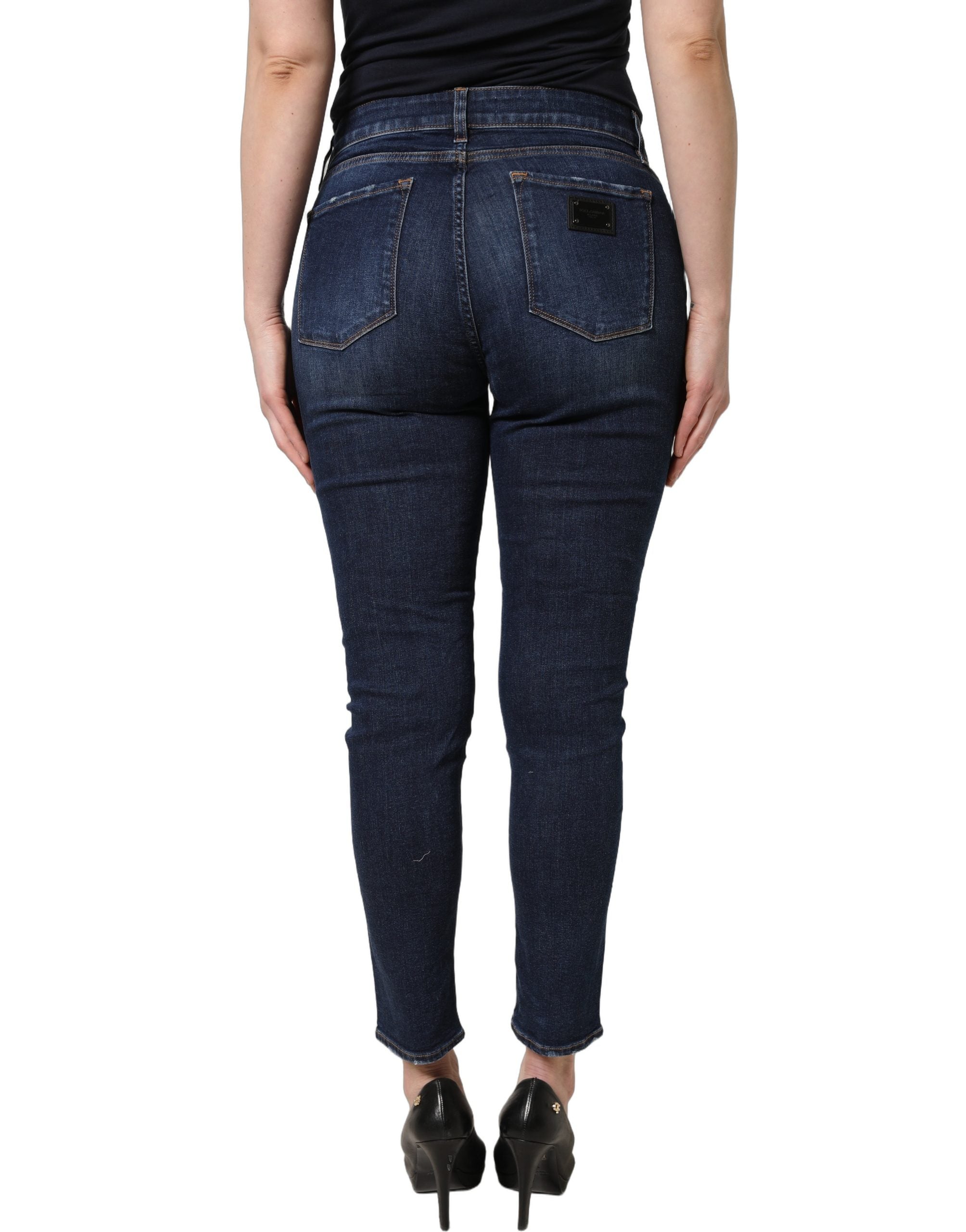 Jeans skinny en denim coton bleu délavé de Dolce & Gabbana, style décontracté avec finitions usées.