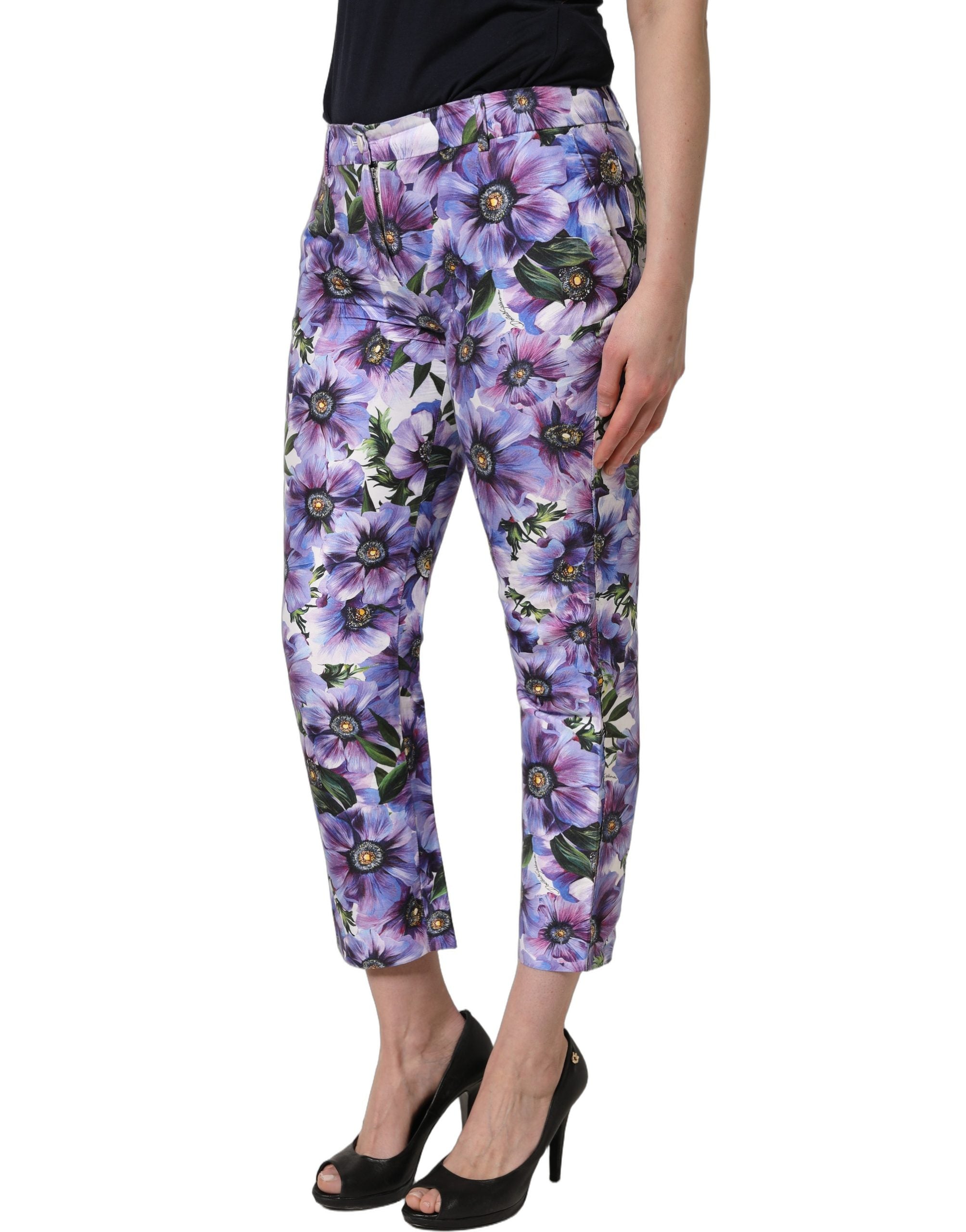 Pantalon cropped Dolce & Gabbana à imprimé floral multicolore, style élégant et moderne, porté sur un mannequin.
