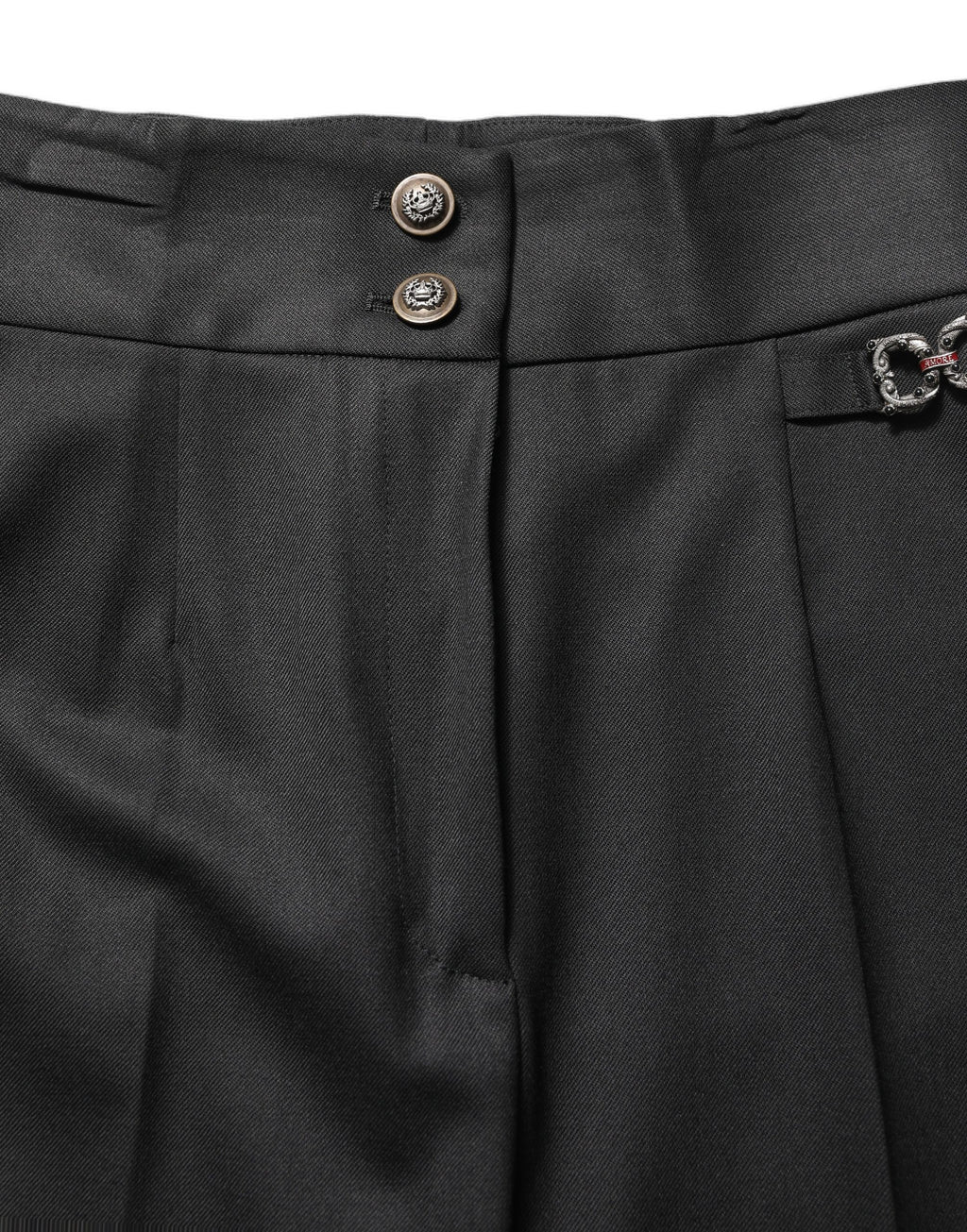 Pantalon en laine noire Dolce & Gabbana à taille haute avec logo, style élégant et moderne.