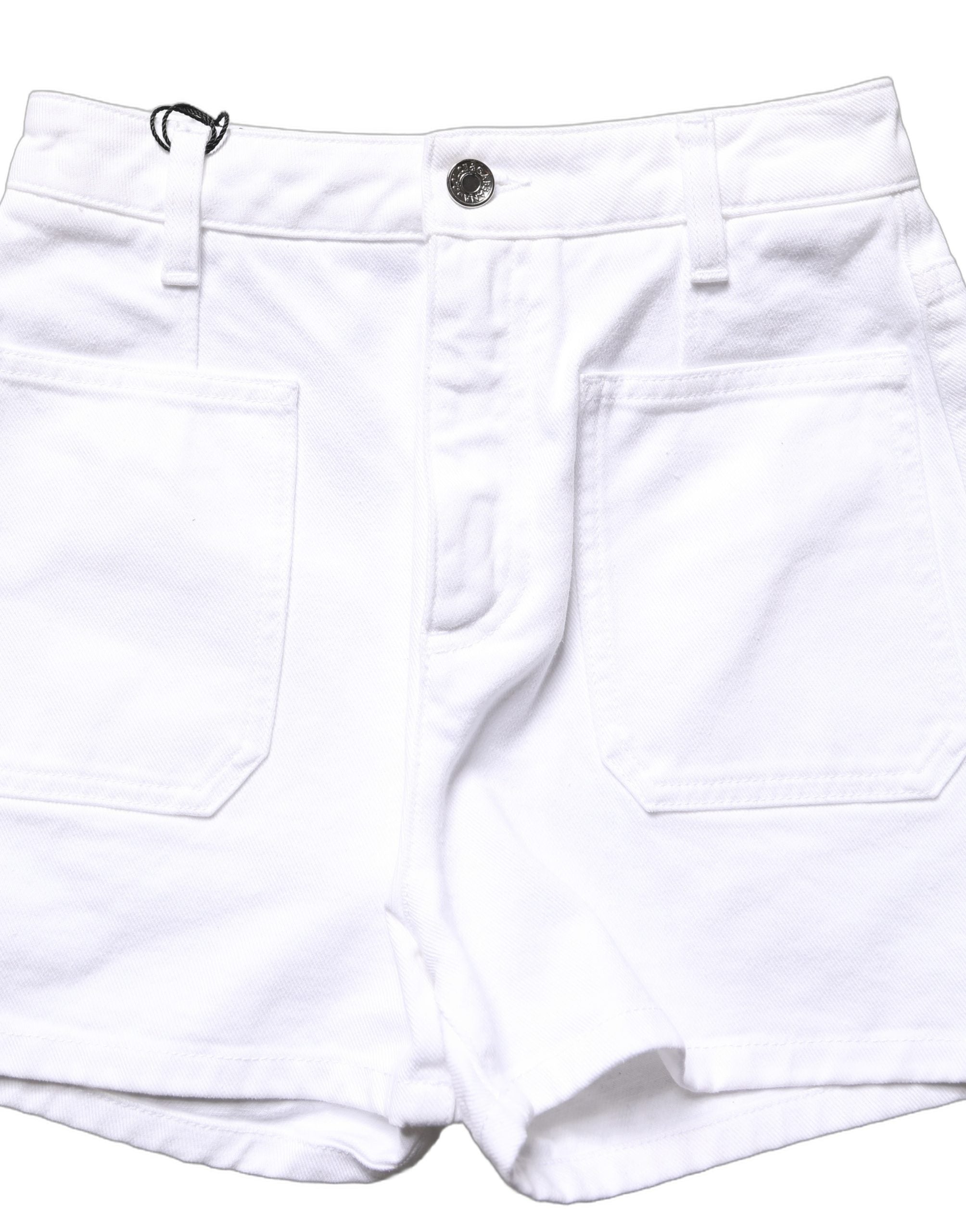 Shorts Dolce & Gabbana en coton blanc, taille haute, en denim, style hotpants, visibles avec détails et couture modernes.