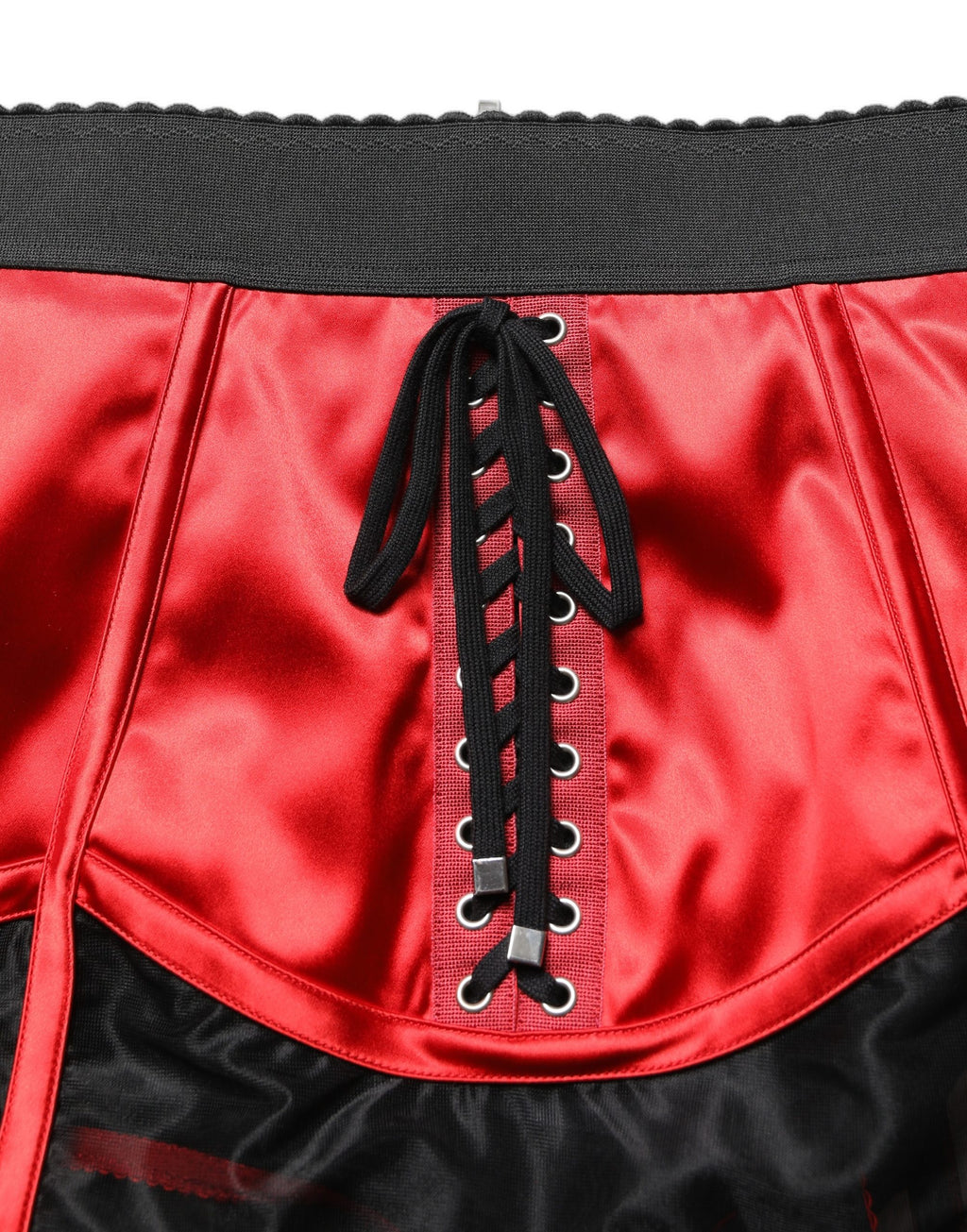 Mini jupe rouge en satin à taille haute et style corset de Dolce & Gabbana, élégante et sophistiquée.