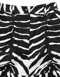 Shorts en coton à taille haute Dolce & Gabbana, motif zèbre noir et blanc, style élégant et tendance.