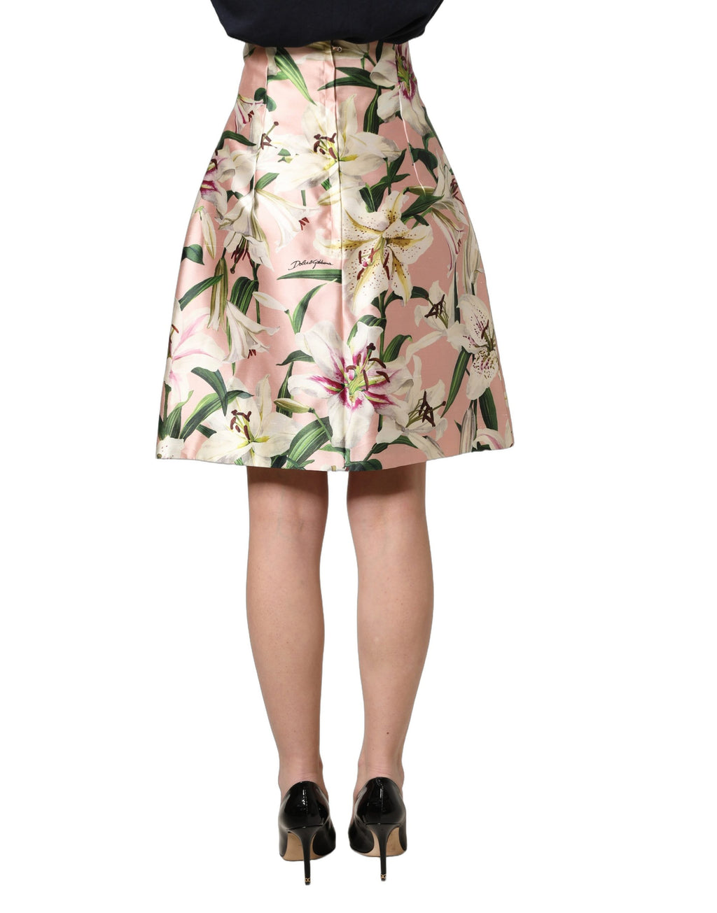 Jupe longue rose à taille haute Dolce & Gabbana en tissu léger, longueur au genou, style élégant et féminin.