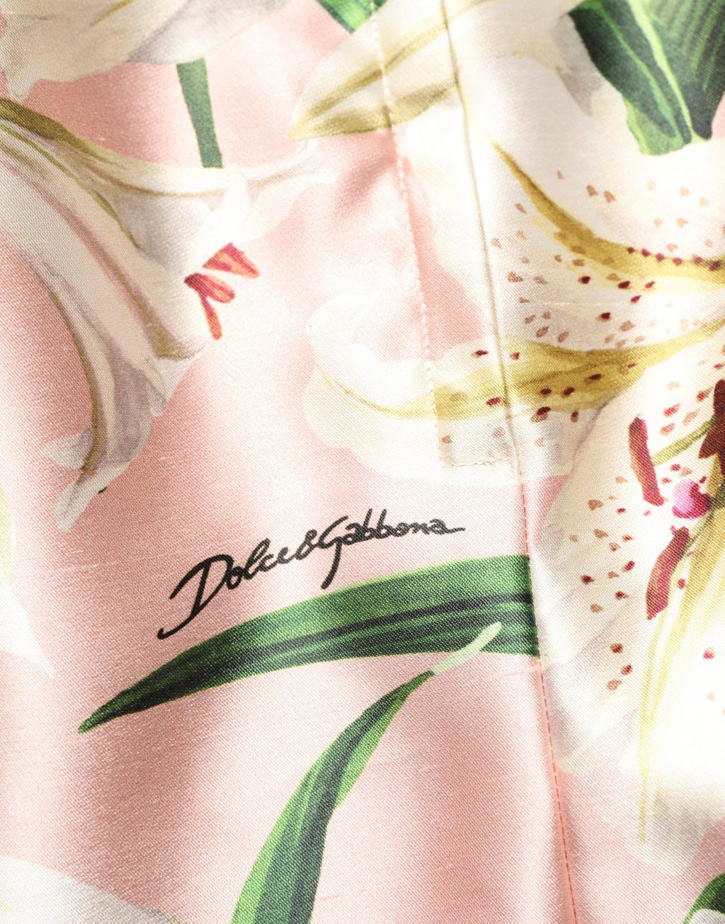 Jupe midi rose à taille haute Dolce & Gabbana Lilium, longueur genou, en tissu léger et élégant.