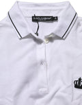 Polo homme Dolce & Gabbana blanc en coton avec col orné d'une couronne, manches courtes, style élégant et tendance.