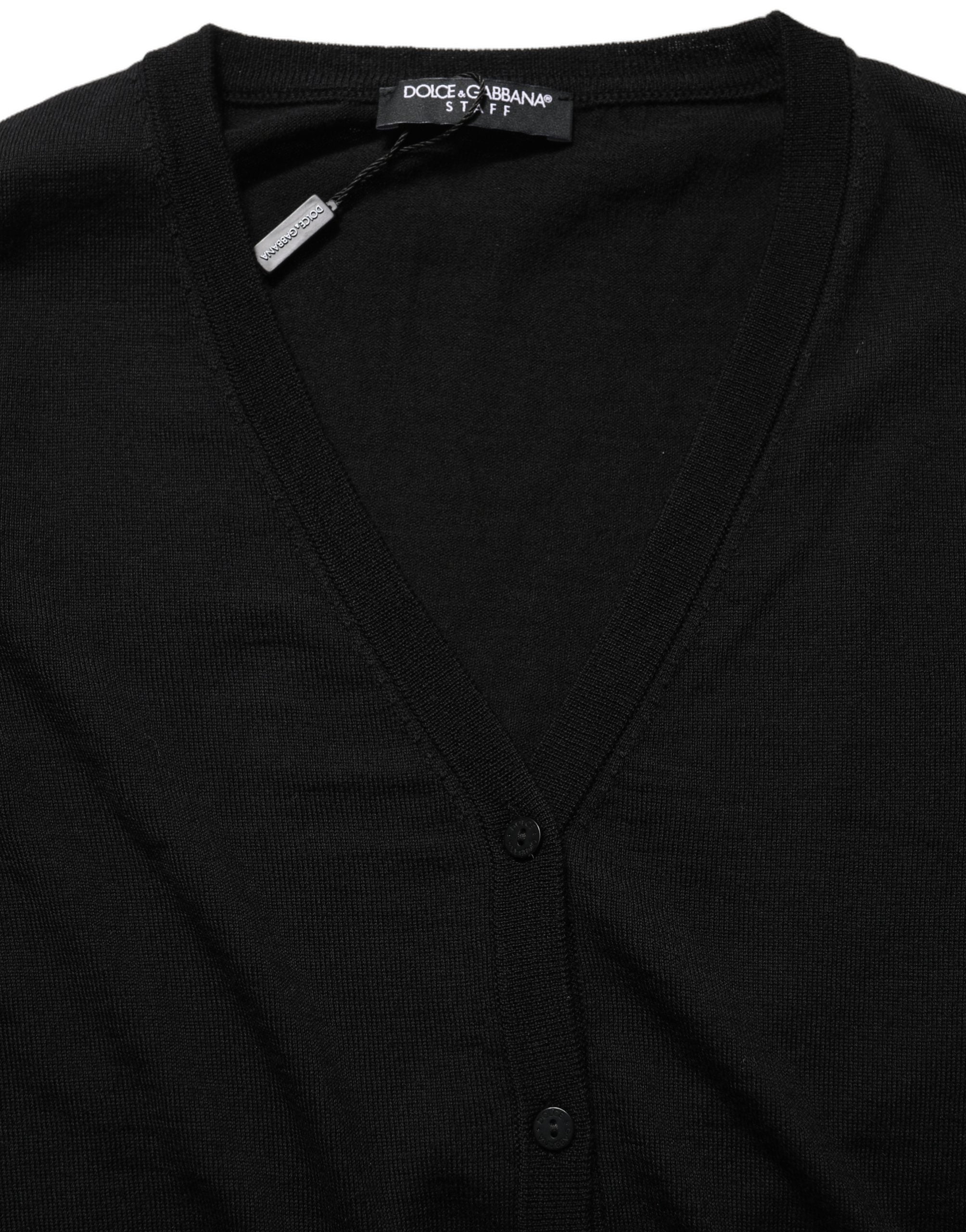 Cardigan en laine noire Dolce & Gabbana avec boutons, confection élégante et chaud, porté sur un mannequin.