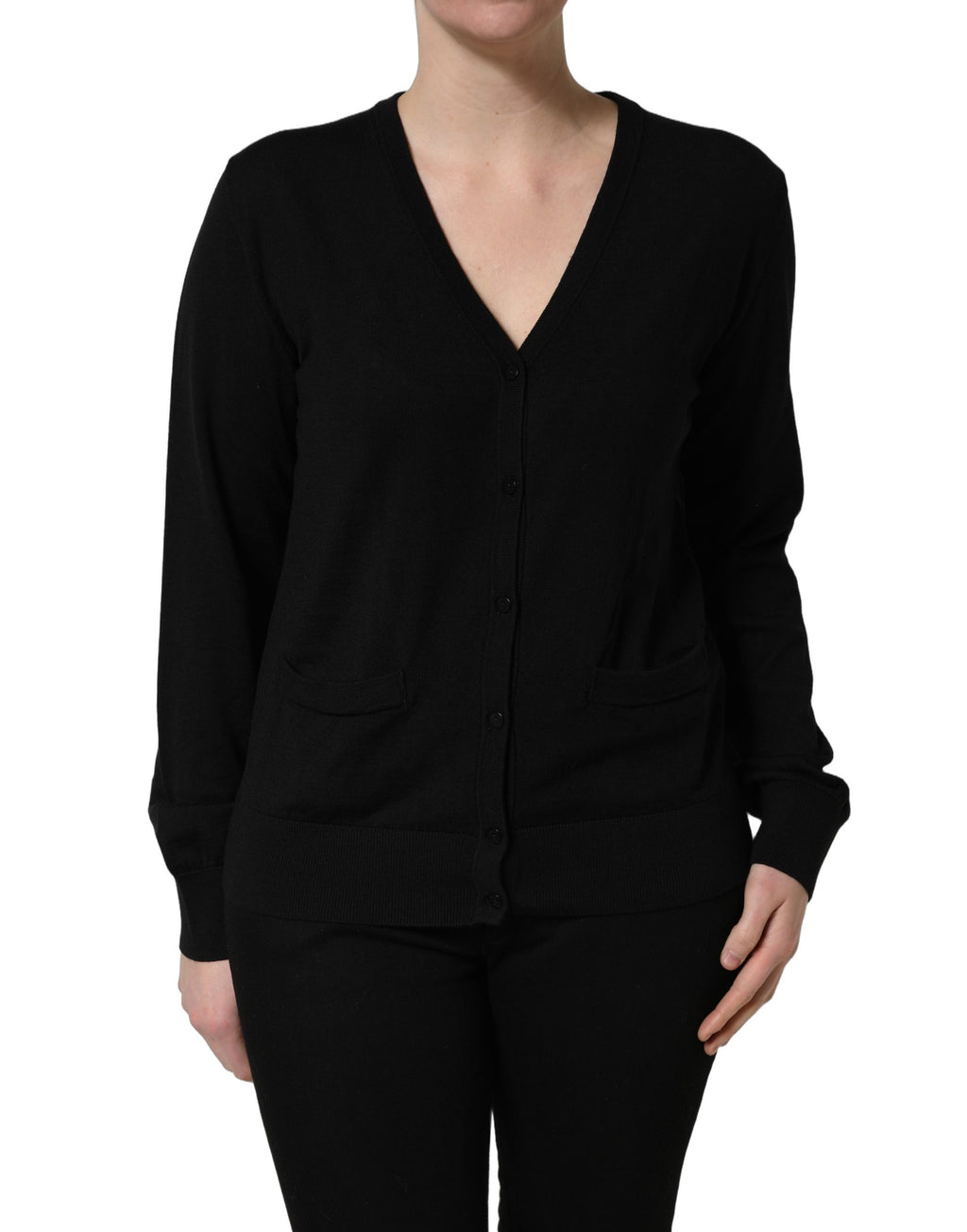 Pull cardigan en laine noire Dolce & Gabbana avec boutons, porté sur un mannequin.
