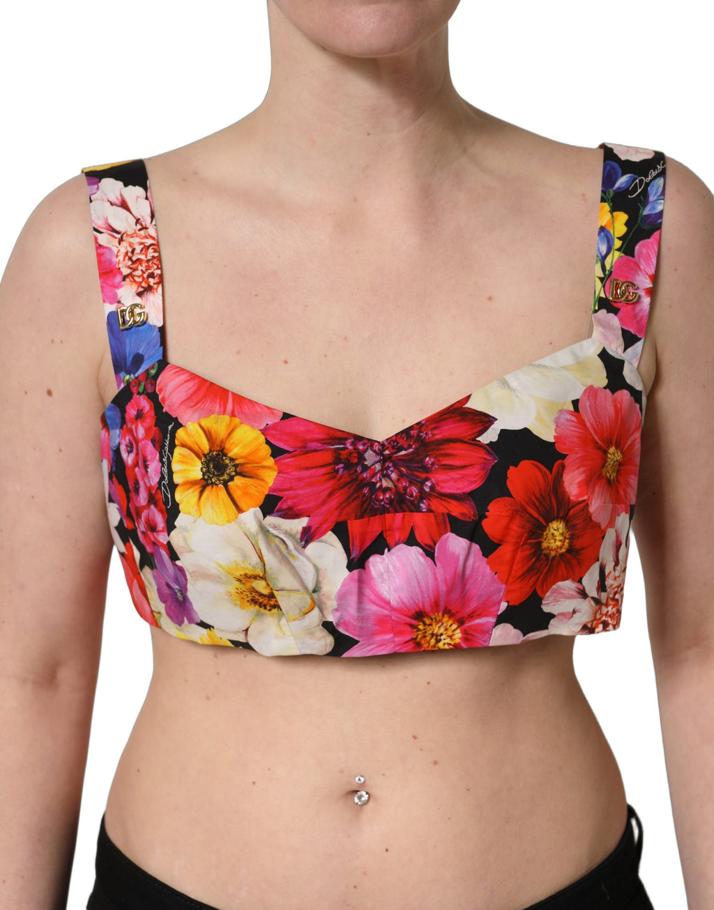Top bustier court à fleurs multicolores de Dolce & Gabbana, avec motifs floraux vifs et coupe courte élégante.