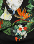 T-shirt rond en coton noir avec motif tropical Dolce & Gabbana, design élégant et confortable, vue de face.