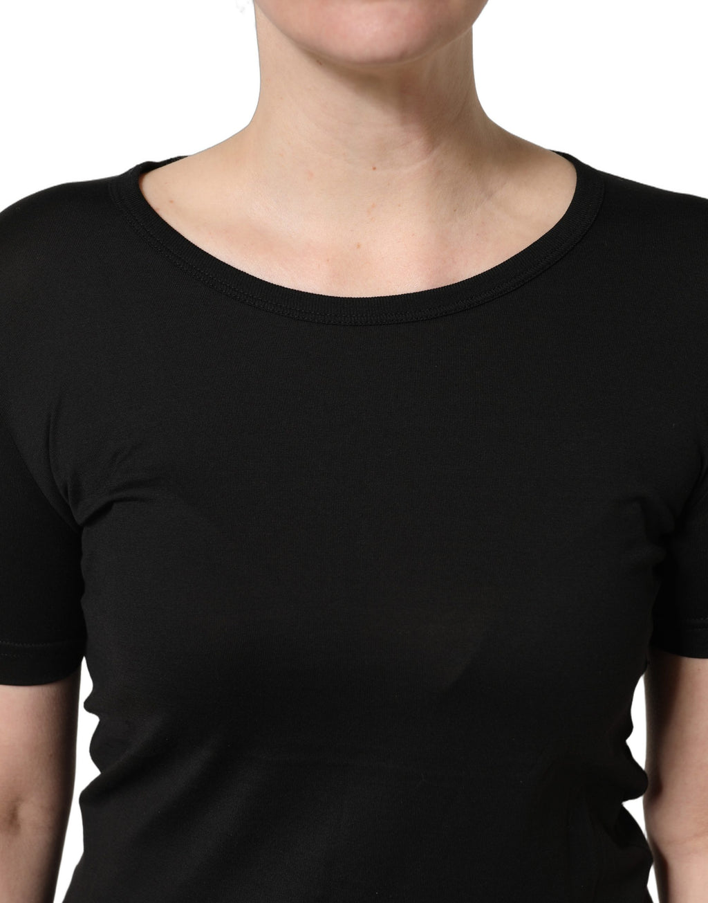 T-shirt noir en coton Dolce & Gabbana à col rond et manches courtes, vue de face, détail du tissu et du design simple.