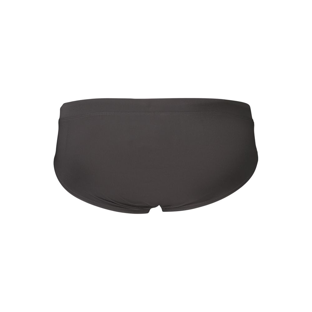 Culottes homme Tommy Hilfiger en polyester noir, style classique, visibles en détail sur l'image.