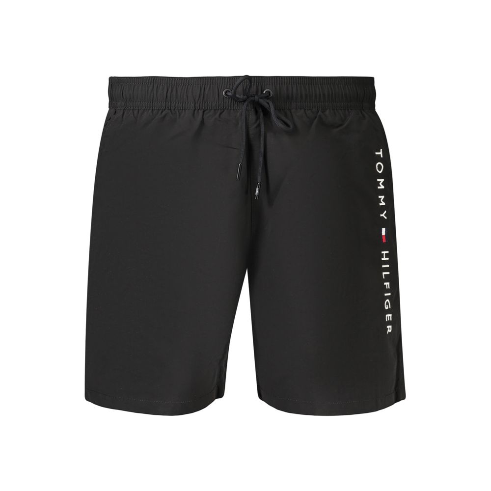 Maillot de bain homme Tommy Hilfiger en polyester noir, style sportif et confortable, adapté à la plage ou à la piscine.