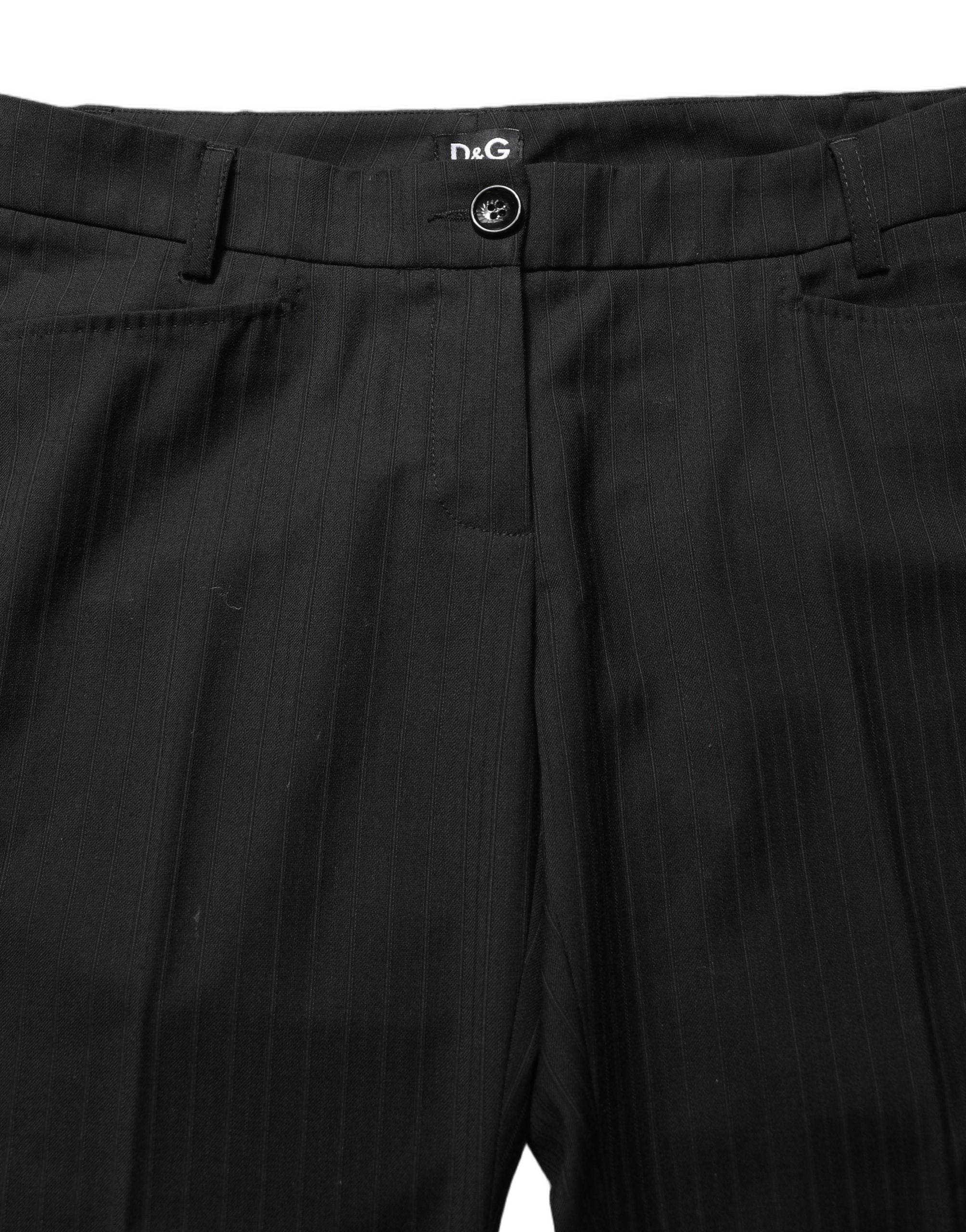 Pantalon noir Dolce & Gabbana en polyester à taille moyenne, élégant et ajusté, visible en détail dans cette image.