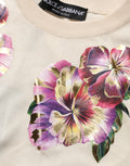 Pull-over en soie beige à fleurs Dolce & Gabbana, col rond, élégant haut à motif floral pour femme.