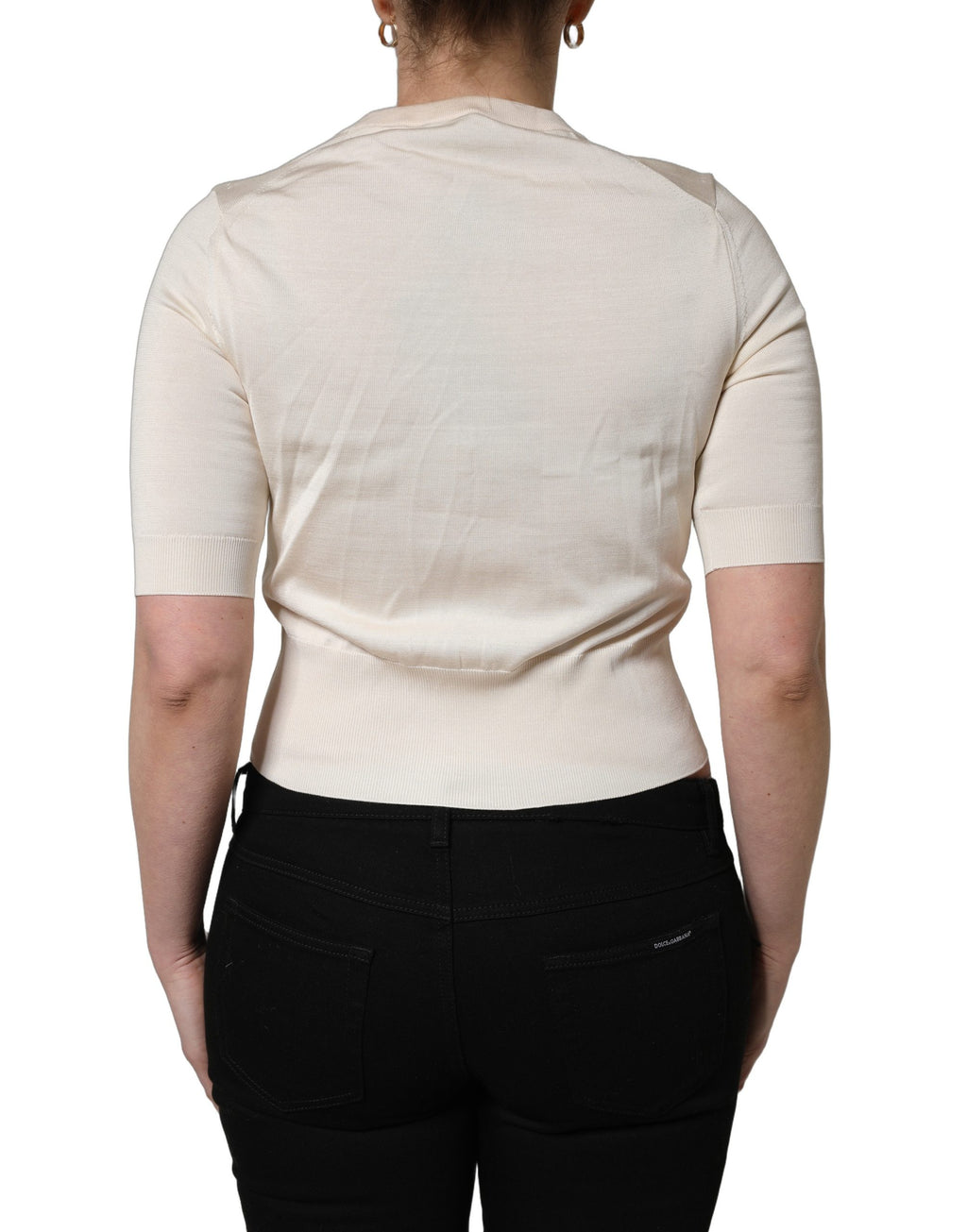 Pull à manches longues en soie beige avec imprimé floral Dolce & Gabbana, col rond élégant.