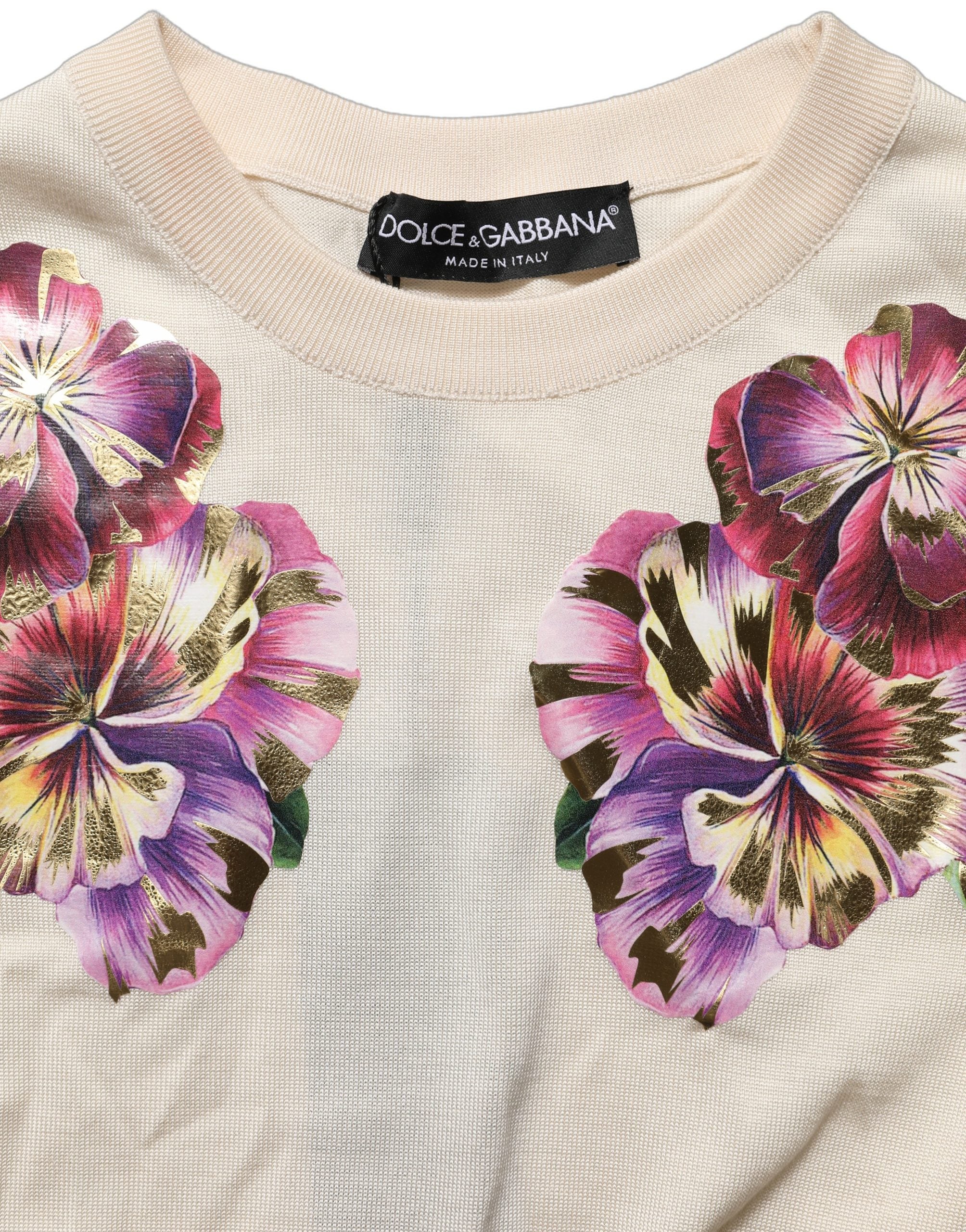 Pull-over en soie beige à fleurs Dolce & Gabbana, col rond, élégant et léger, idéal pour un style sophistiqué et féminin.