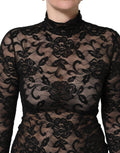 Haut à manches longues Dolce & Gabbana, en dentelle florale noire avec col roulé, élégant et féminin.