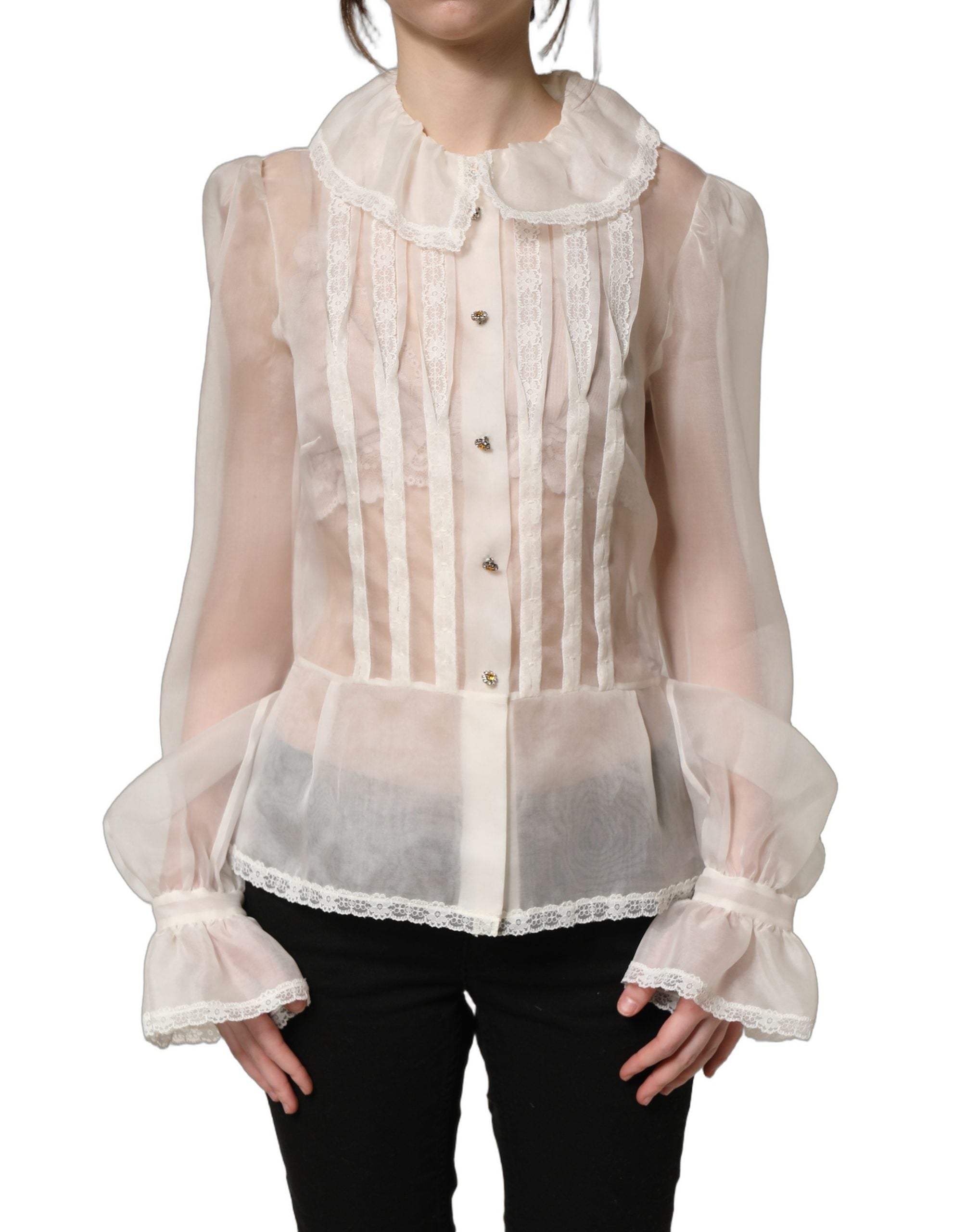 Blouse blanche en soie transparente à volants et boutons Dolce & Gabbana, vue de face, élégante et légère.