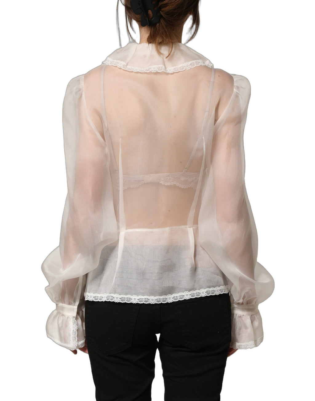 Blouse blanche en soie translucide à volants et boutons de Dolce & Gabbana, style élégant et féminin.