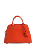 Sac Louis Vuitton Montaigne en cuir monogrammé avec poignée en cuir et détails en métal doré, vue de face.