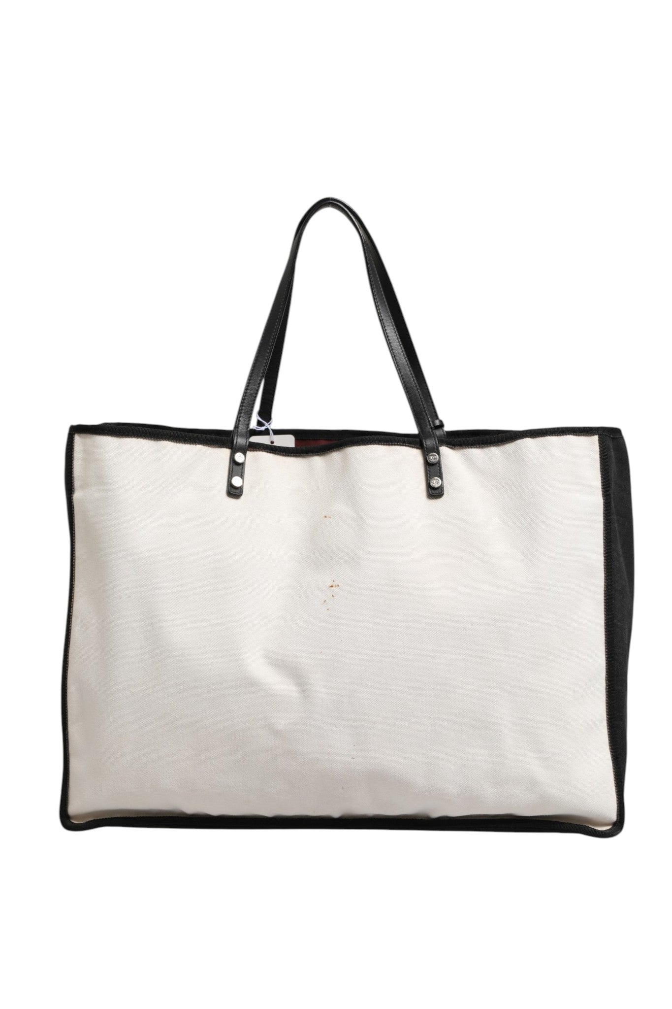 Sac à main Chanel Ladies First en toile blanche et noire, sac à bandoulière élégant pour femmes.
