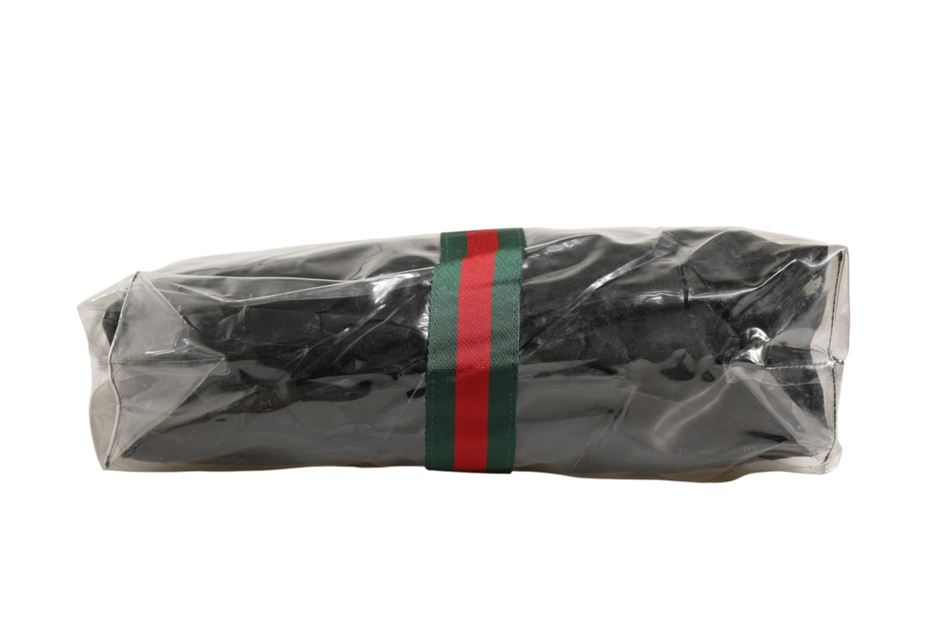Sac tote Gucci GG x Comme des Garçons avec logo emblématique, en tissu durable et poignées solides, pour un style tendance.