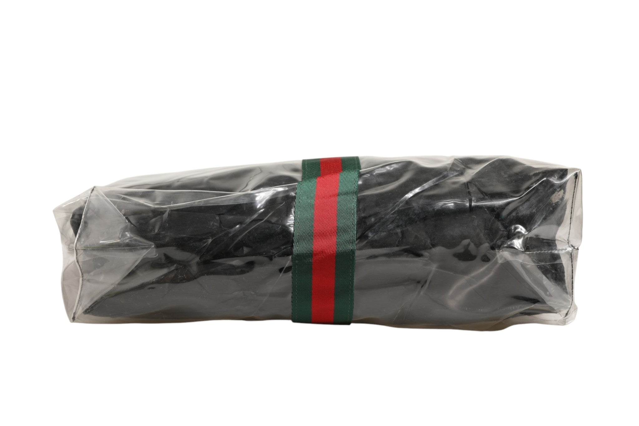 Sac tote Gucci GG x Comme des Garçons avec logo emblématique, en tissu durable et poignées solides, pour un style tendance.