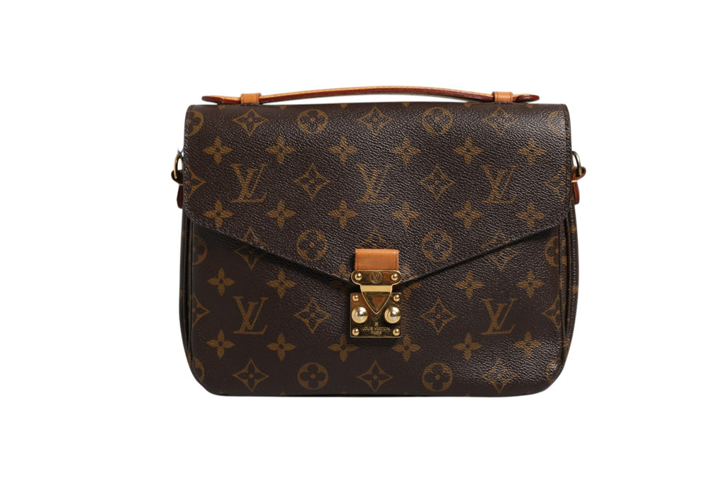 Pochette Métis Louis Vuitton en toile Monogram avec bandoulière en cuir et fermeture métallique visible.