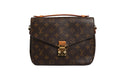 Pochette Métis Louis Vuitton en toile Monogram avec bandoulière en cuir et fermeture métallique visible.