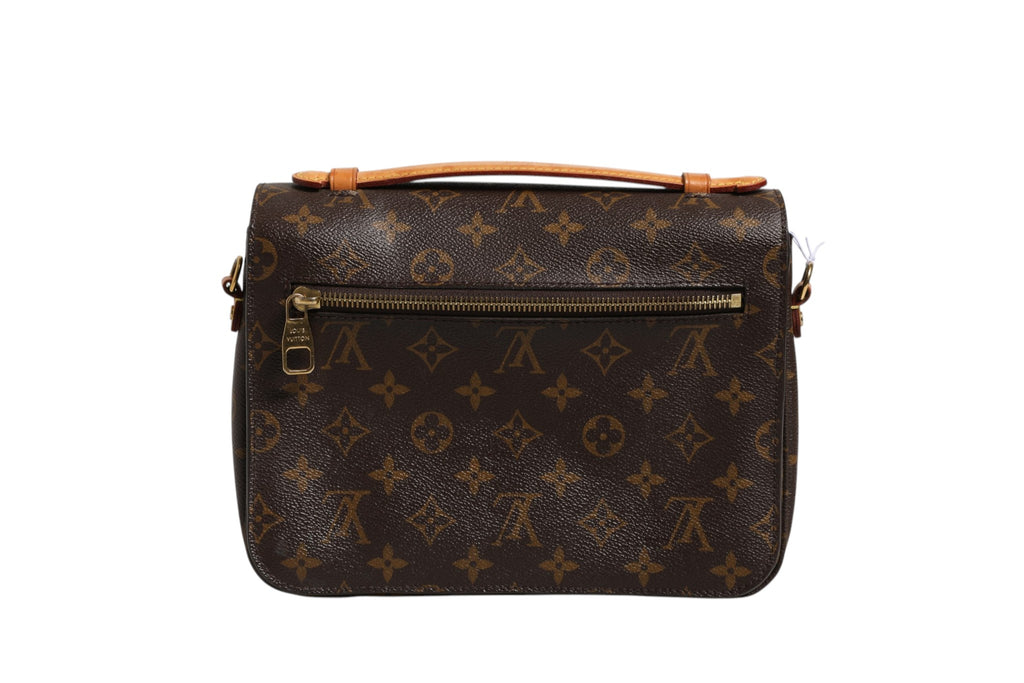 Pochette Métis Louis Vuitton en toile Monogram avec bandoulière, compartiments intérieurs et fermeture metal, vue de face.