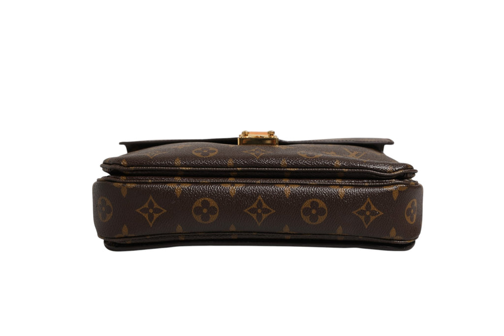 Pochette Métis Louis Vuitton en toile Monogram avec bandoulière et poche extérieure, élégant sac à main en cuir.