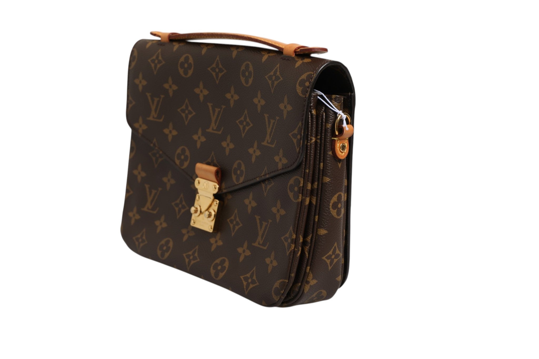 Sac pochette Métis Louis Vuitton en toile monogramme, avec poignée en cuir et fermeture éclair visible.