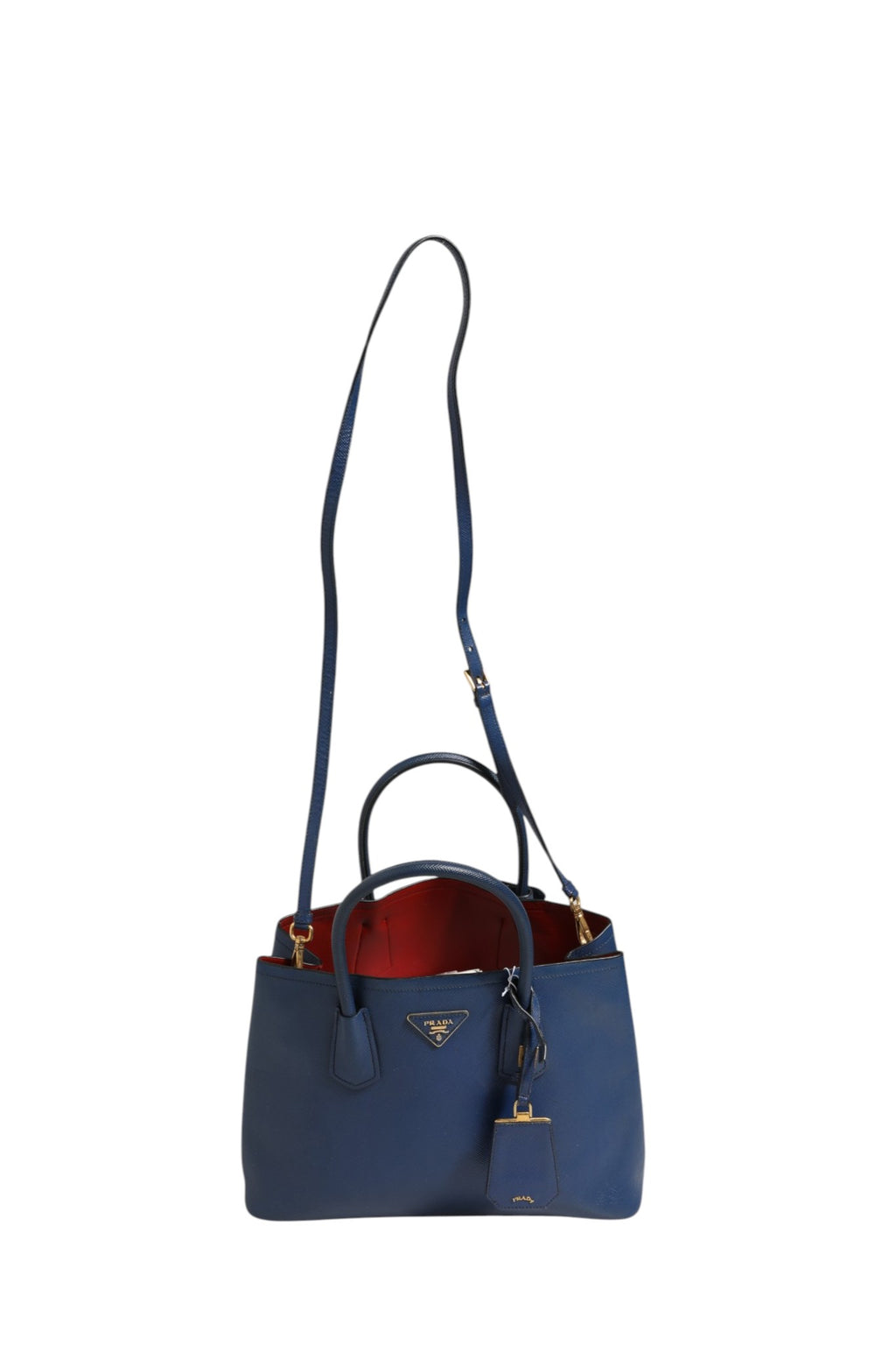 Sac Prada en cuir saffiano bleu, sac à main à bandoulière et poignée, design élégant et moderne.