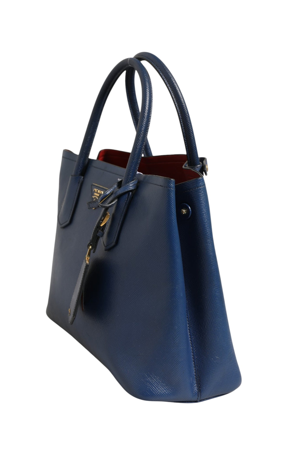 Sac à main Prada en cuir saffiano bleu, sac à deux façons, avec poignée et bandoulière réglable.