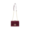 Sac à main en polyester bordeaux de la marque Armani Exchange, avec poignées et détails élégants.