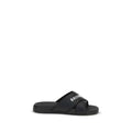 Sandales en caoutchouc noires Balenciaga, chaussures décontractées avec semelle épaisse et design moderne.