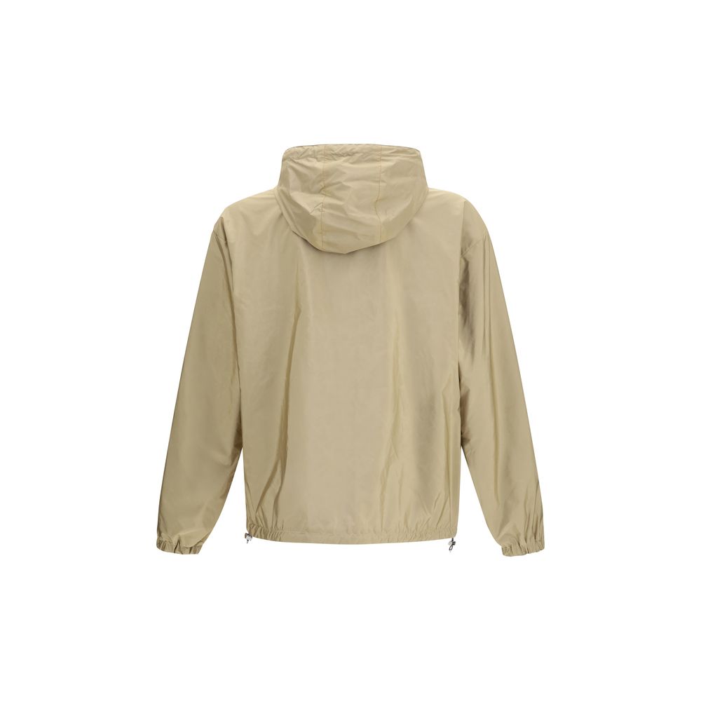 Veste Prada beige en polyamide recyclé avec capuche et fermeture éclair, vue de face.