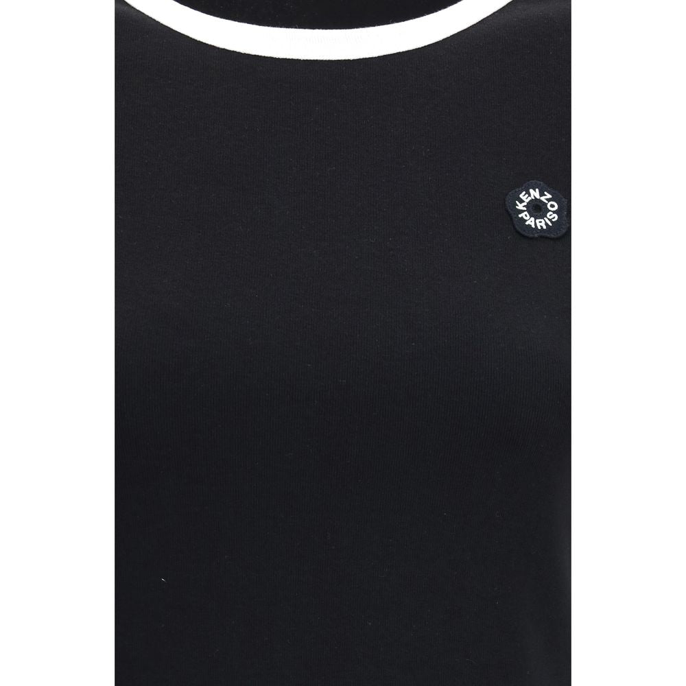 T-shirt en coton noir de la marque Kenzo avec logo visible, porté sur un fond neutre, mise en valeur du style décontracté.